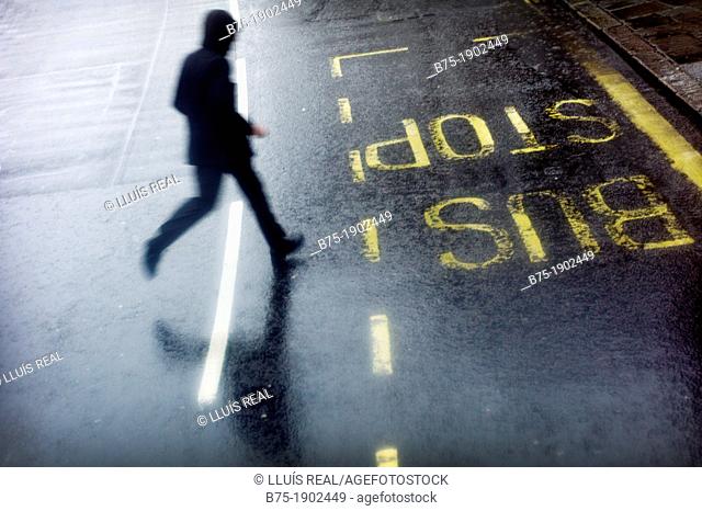 UK, England, London, Man running across street