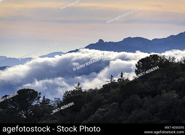 Views from the Puigcerver hermitage on a winter day with low clouds (Baix Camp, Tarragona, Catalonia, Spain)
