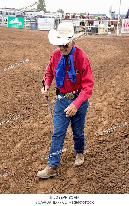 JULY 22, 2017 NORWOOD COLORADO - older cowboy walks at San Miguel Basin Rodeo, San Miguel County Fairgrounds