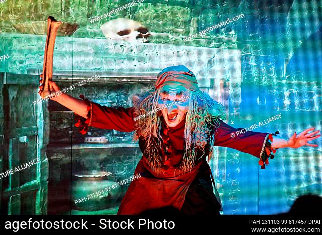 03 November 2023, Saxony-Anhalt, Brocken: A witch stands in front of an LED wall in a scene from Goethe's Faust. After a four-year break