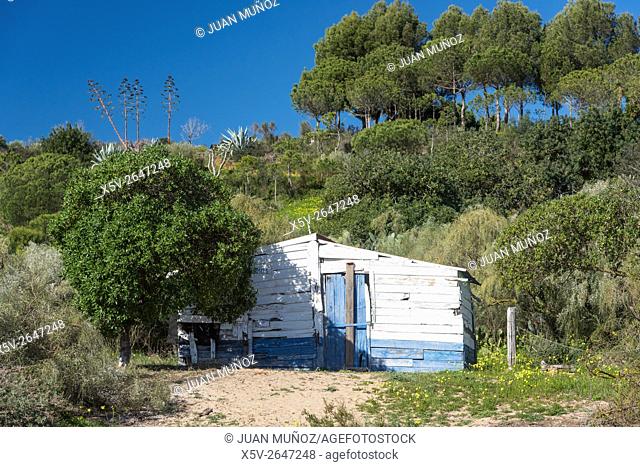 Wooden hut. Decorated with colors typical of the Algarve. Cancela Velha. Portugal