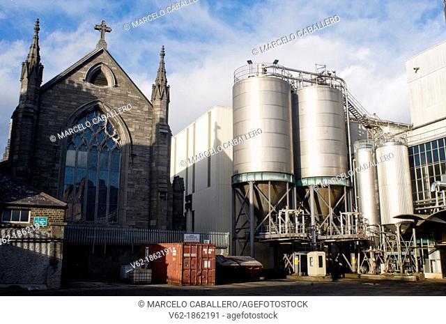 Factory brewing of Guinness in Dublin. Next, small factory historic church where they were to pray employees of the company