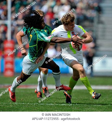 06 05 2012 Glasgow, Scotland HSBC Sevens World Series Tom Mitchell gets tackled by Branco du Preez during the game between Engalnd and South Africa at the...