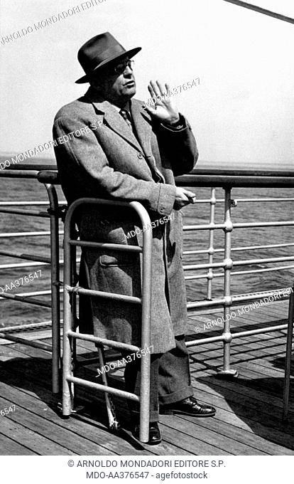 Giuseppe Ambrosini leaning on a parapet. Italian journalist and founder of Guerin Sportivo Giuseppe Ambrosini leaning on a parapet during a sportswriters'...