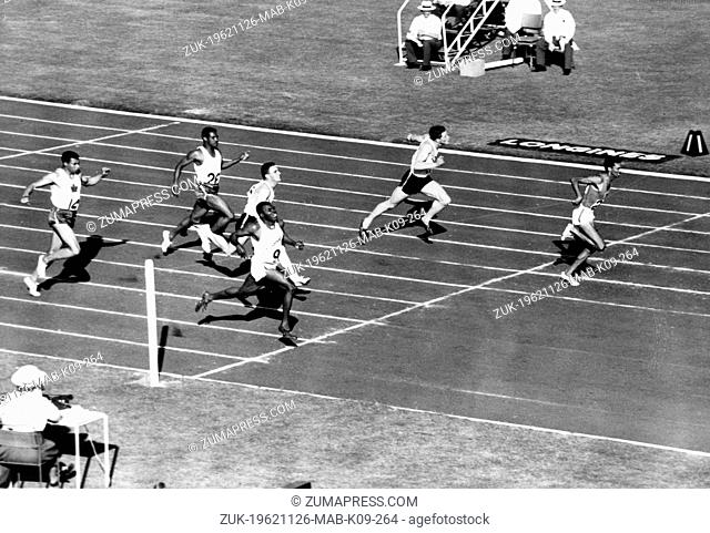 Nov. 26, 1962 - London, England, U.K. - SERAPHINO ANTAO of Kenya winning the final of the men's 100 yards from TARDY ROBINSON of the Bahamas with GARY...