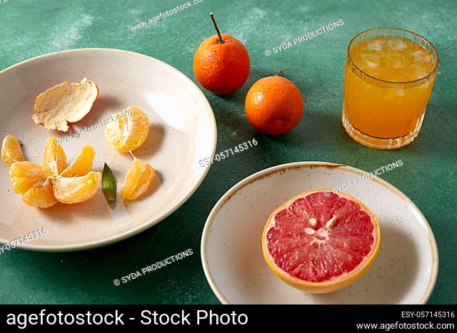 mandarins, grapefruit and glass of juice