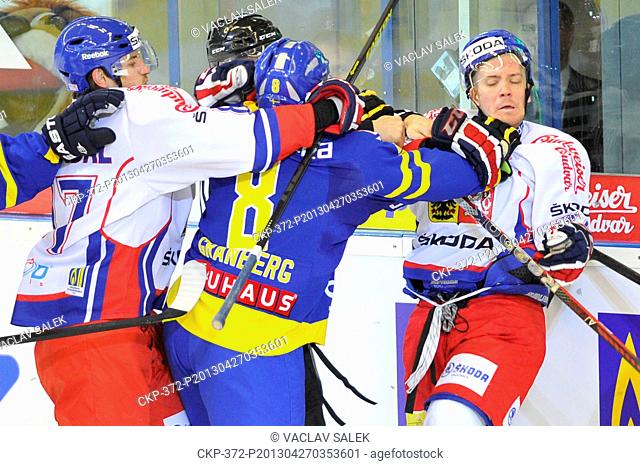From left: Jakub Nakladal (CZE), Petter Granberg of Sweden and Tomas Rachunek (CZE) during the Euro Hockey Tour ice hockey match Czech Republic vs