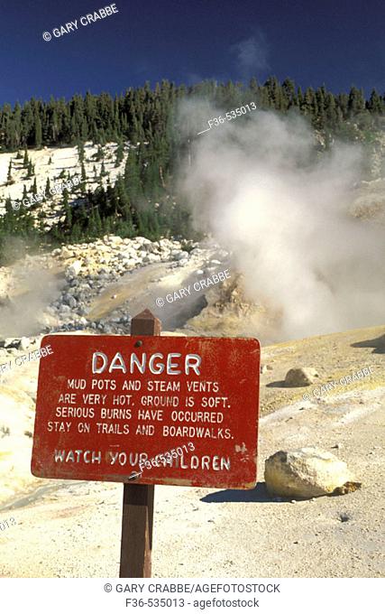 Danger warning sign next to hydrothermal hot spirng at Bumpass Hell, Lassen Volcaninc National Park, California