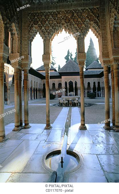 Patio de los Leones (Court of Lions), in the Moorish palace of Alhambra. Granada. Spain