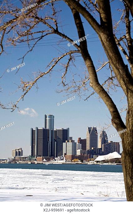 Detroit, Michigan - Downtown Detroit and partially-frozen Detroit River in winter  General Motors headquarters in the Renaissance Center is in the tall