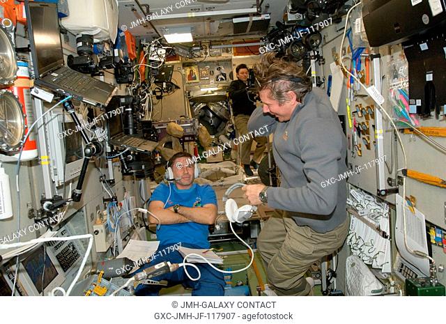 Russian cosmonauts Gennady Padalka (right), Expedition 32 commander; and Yuri Malenchenko, flight engineer, are pictured near the manual TORU docking system...