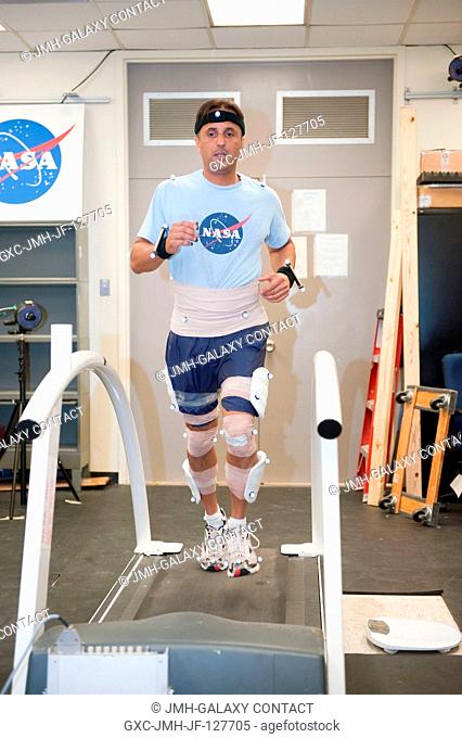 NASA astronaut Joe Acaba, Expedition 3132 flight engineer, participates in a treadmill kinematics baseline data collection session in the Planetary and Earth...