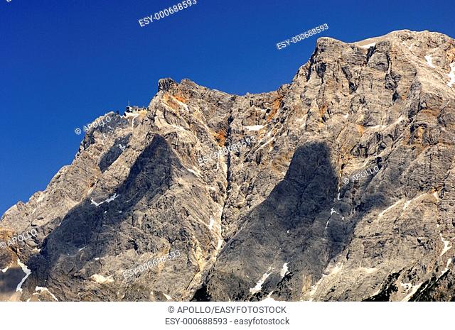Crest of the Wetterstein mountain range with Mt  Zugspitze and the upper station of the Tyrol Zugspitze cable car, Ehrwald, Tyrol, Austria