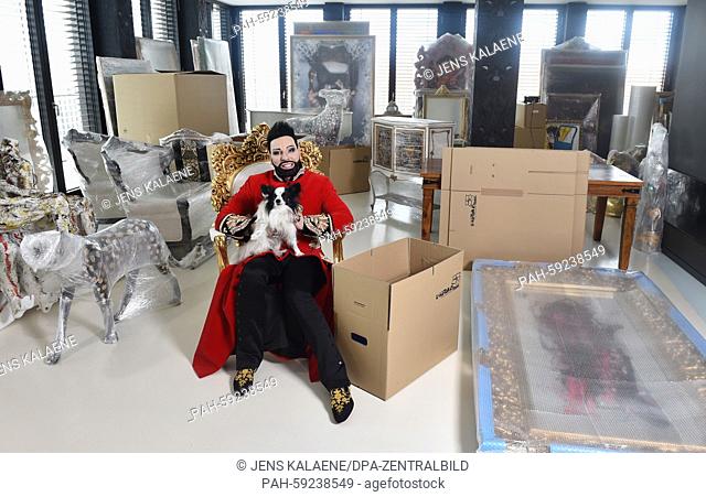 EXKLUSIVE- Star designer Harald Glööckler with his Papillon Billy King in his luxury penthouse apartment among packed boxes and wrapped furnitures and art...