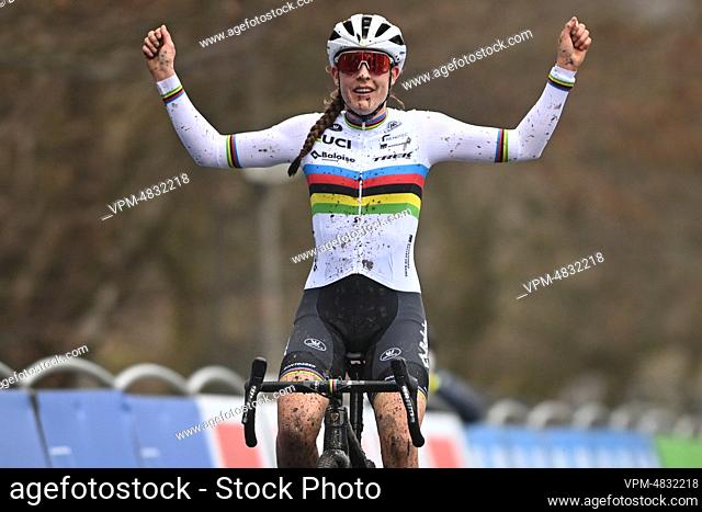 Dutch Lucinda Brand celebrates as she crosses the finish line to win the women elite race of the 'Flandriencross' cyclocross cycling event
