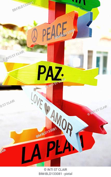 Colorful road signs to Peace and Love