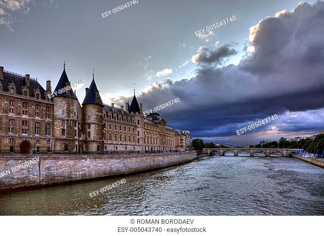 Conciergerie before rain in Paris, dramatic cloudscape