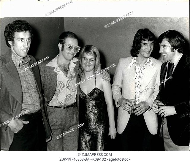 Mar. 03, 1974 - Elton John - Birthday Boy.... Celebration his 27th birthday at the Room at the Top, Ilford, Essex pop star Elton John joined in the fun with...
