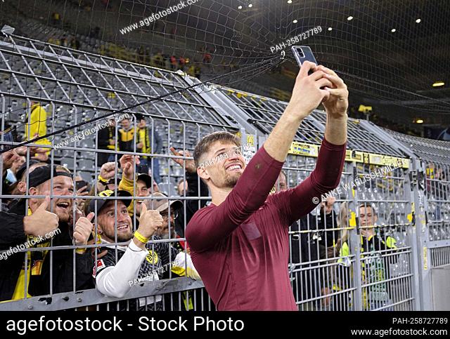 goalwart Gregor KOBEL (DO) makes a selfie with fans after the game Soccer Champions League, preliminary round 2nd matchday