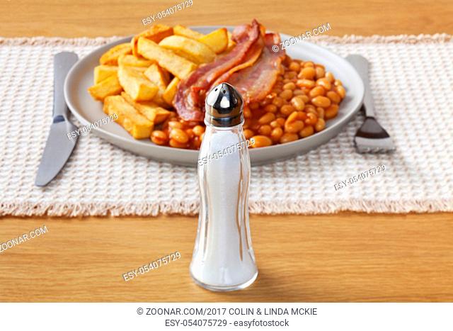 Salt and Fried Food - salt and a typical high salt, high fat meal of chips, bacon and baked beans