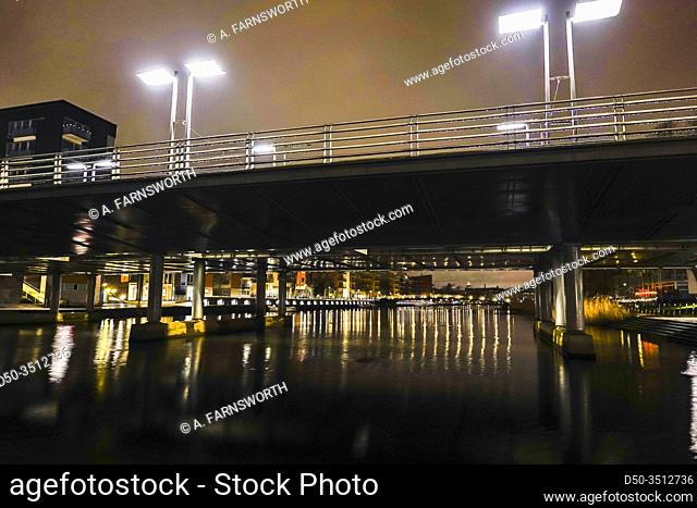 STOCKHOLM, SWEDEN A bridge on Sickla Canal at night in Hammarby Sjostad