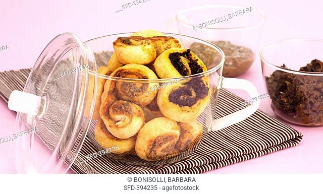 Palmiers filled with olive- and with anchovy paste
