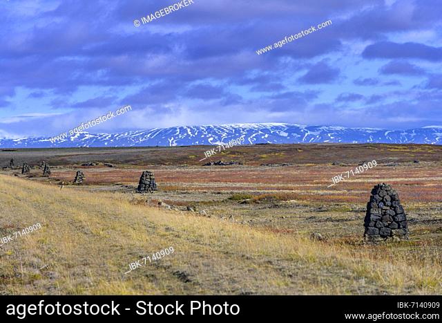 Old waymarkers with cairns Near the ring road to, Myvatn, Norðurland eystra, Iceland, Europe