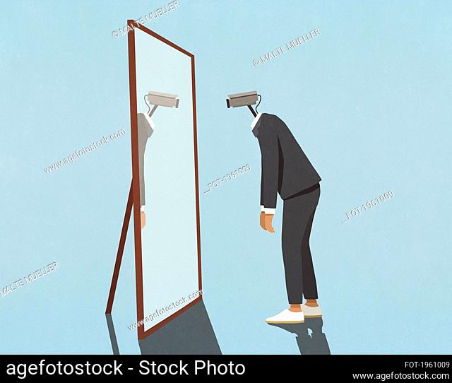 Man with surveillance camera face looking into mirror