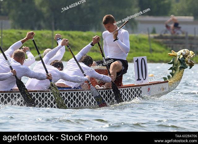 RUSSIA, MOSCOW - JULY 6, 2023: A team competes at the 2023 Russian Dragon Boat Racing Championships on Moskva Rowing Canal in Krylatskoye