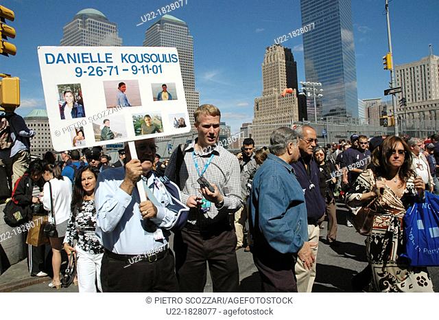 New York City, people gathering to commemorate the victims of the 9/11 terrorist attack, on the anniversary of the massacre, by the former Twin Towers
