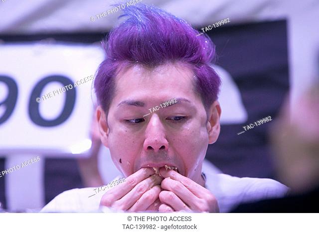 Takeru Kobayshi competes during the taco eating contest at The Sabroso Craft Beer, Taco, and Music Festival on April 8, 2017 in Dana Point, California