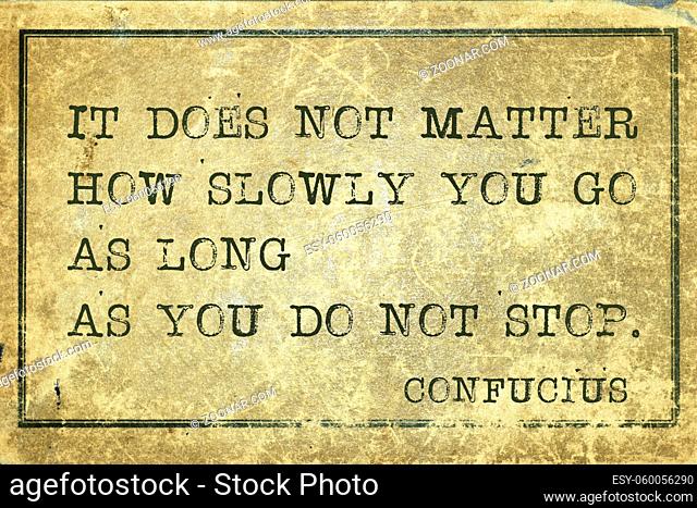 it does not matter how slowly you go - ancient Chinese philosopher Confucius quote printed on grunge vintage cardboard