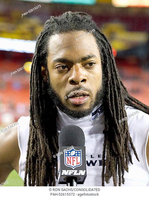 Seattle Seahawks left cornerback Richard Sherman (25) is interviewed following the game against the Washington Redskins at FedEx Field in Landover