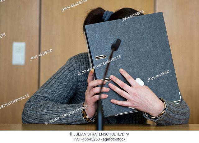 Defendant Evgeniya C. appears at the district court in Hildesheim, Germany, 21 February 2014. The mother of a dead infant has been sentenced to five years in...