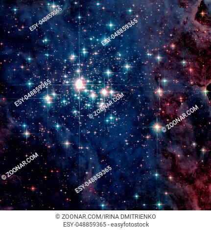 Star cluster Trumpler 14. One of the largest gatherings of hot, massive and bright stars in the Milky Way galaxy. Retouched colored image
