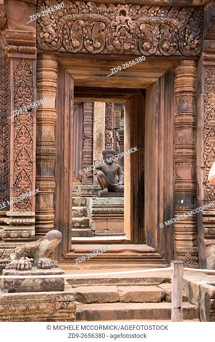 Elaborate carved pink stone distinguishes the temple of Banteay Srey