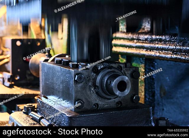RUSSIA, LUGANSK - DECEMBER 7, 2023: Equipment produces exhaust valves at AMZ AvtoMotoZapchast, a producer of ICE valves and cooling radiators
