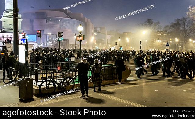 FRANCE, PARIS - FEBRUARY 7, 2023: Riot police and participants in a mass protest staged by trade unions against the controversial pension reform proposed by the...