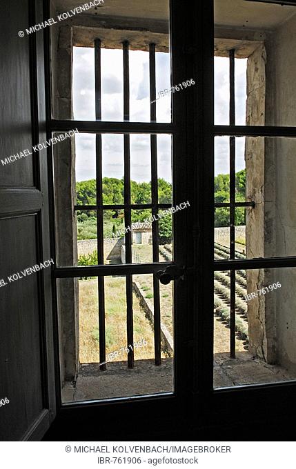 View through the barred window in Vincent Van Gogh's reconstructed room in the St. Paul de Mausole Asylum on the outskirts of St