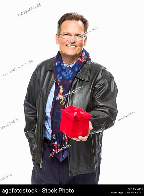 Handsome Man Wearing Black Leather Jacket and Holiday Scarf Holding Christmas Gift Isolated on White Background