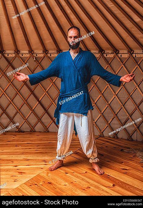 dancing warrior, ceremonial dance in a yurt