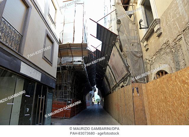 Buildings which were damaged as a result of an earthquake in April 2009 and are in the process of being restored, in L' Aquila, Italy, 25 August 2016