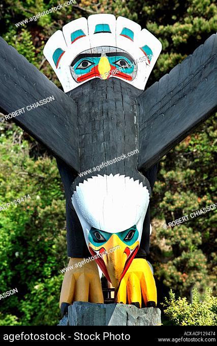 Detail of a wood sculpture entitled 'Thundering Wings' by Chilkoot Tlingit carver Nathan Jackson located next to cruise ship dock 3 in Ketchikan, Alaska, U
