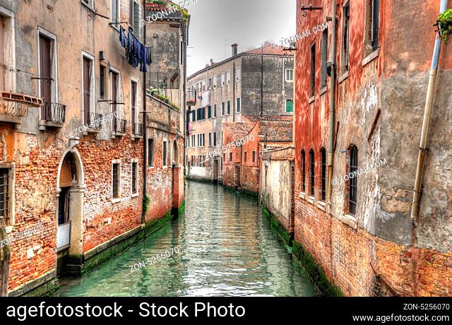 Canal in Venice with ancient hoses, Venice, Italy (HDR)