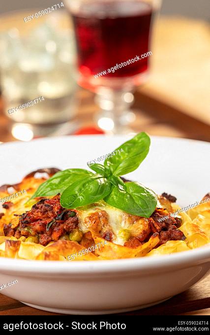 tagliatelle baked with cheese on a plate