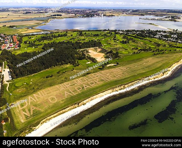 24 August 2023, Schleswig-Holstein, Burg (fehmarn): The words ""Daniel we don't want your national park"" are written on a field on the south coast of Fehmarn