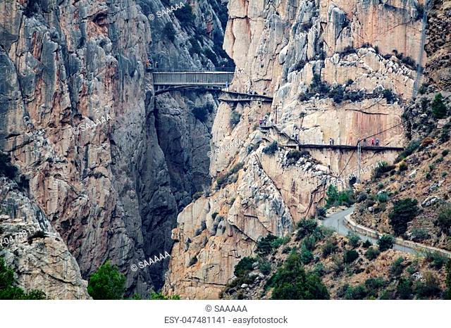 Caminito del rey antique bridge with tourists, very long shot, vintage view