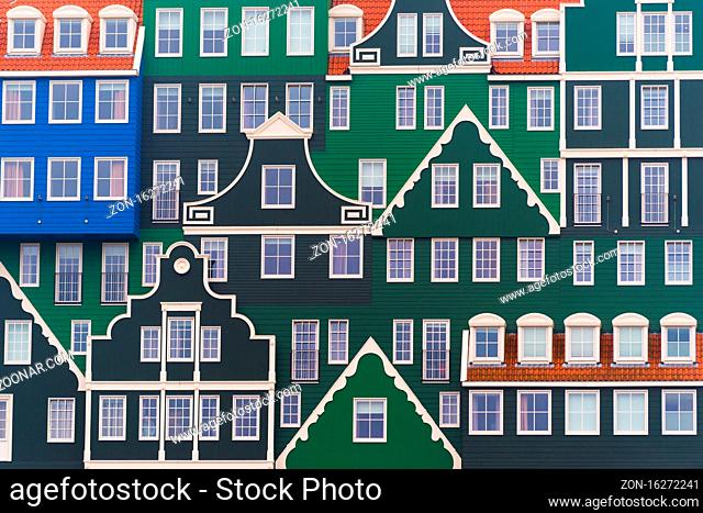 ZAANSTAD, NETHERLANDS - NOVEMBER 13, 2016: Typical facade of the Inntel hotel, opened in 2010. It is an accumulation of almost seventy separate Zaanse houses
