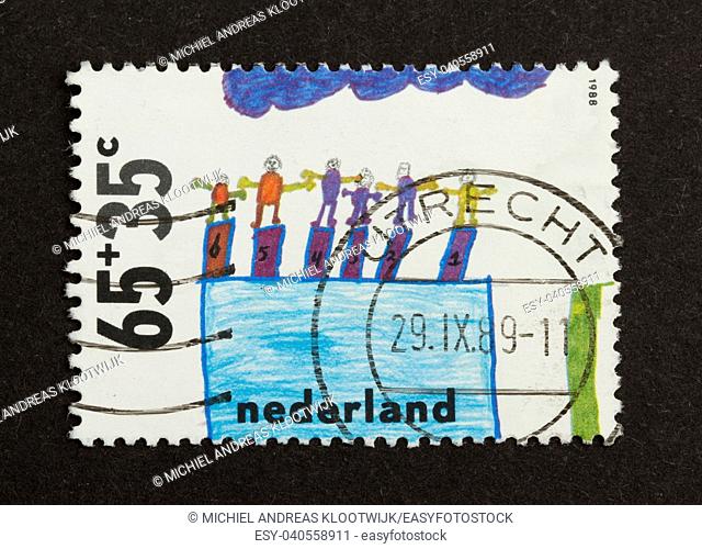 HOLLAND - CIRCA 1980: Stamp printed in the Netherlands shows a drawing of a swimming pool (child), circa 1980