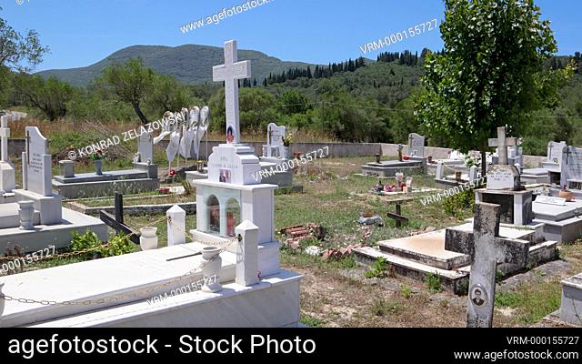 Graves on a cemetery near Vouniatades village on the Greek island of Corfu, 4k video